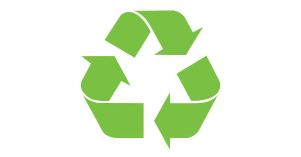 Iconic green recycling sign with arrows going around in a circle on a white background.