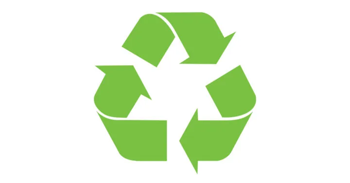 Iconic green recycling sign with arrows going around in a circle on a white background.