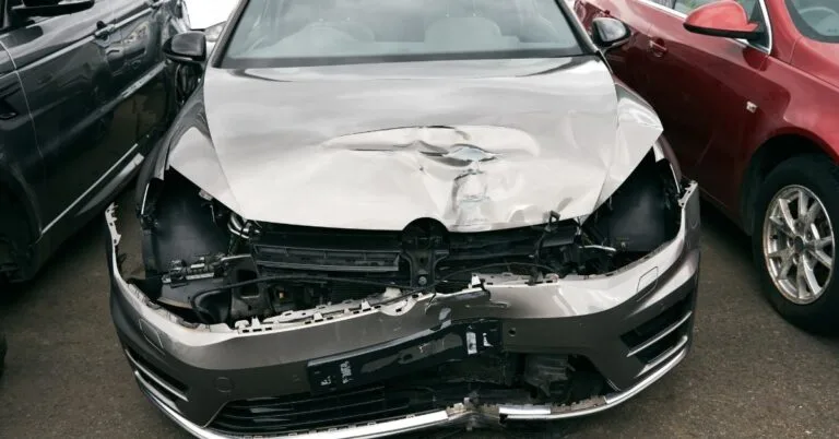 Badly damaged right off in car recycling or insurance pound.